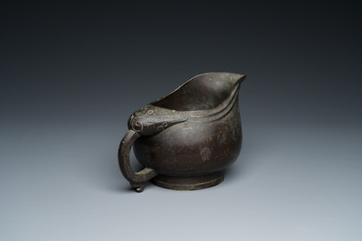 A rare Chinese inscribed archaistic bronze 'Yi' pouring vessel, Zhenghe, Northern Song