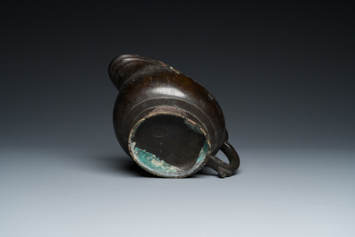 A rare Chinese inscribed archaistic bronze 'Yi' pouring vessel, Zhenghe, Northern Song