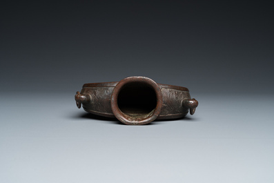 A Chinese archaistic bronze moonflask or 'bianhu', Song/Yuan