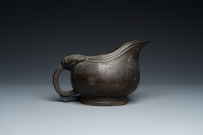 A rare Chinese inscribed archaistic bronze 'Yi' pouring vessel, Zhenghe, Northern Song
