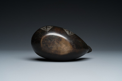 A Chinese inscribed archaistic bronze 'Yi' pouring vessel, Ming dynasty