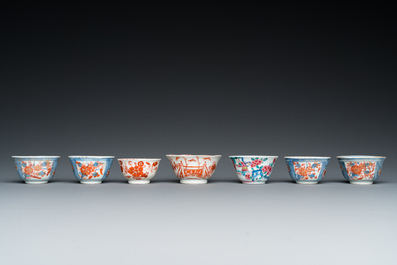Sixteen Chinese famille rose and Imari-style saucers and seven cups, Kangxi and later