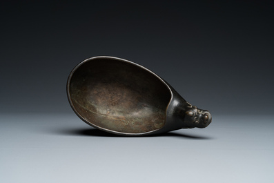 A Chinese inscribed archaistic bronze 'Yi' pouring vessel, Ming dynasty