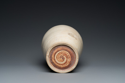 A Vietnamese white-glazed pottery vase with four ring handles, Ly, 11/13th C.