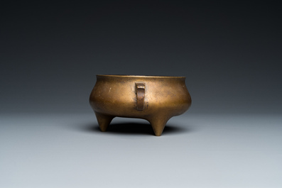 A Chinese bronze tripod censer, Xuande mark, 18th C.