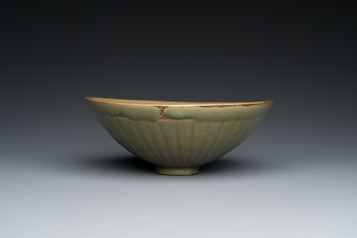 A Chinese Yaozhou celadon bowl with underglaze floral design, probably Song