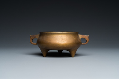 A Chinese bronze tripod censer, Xuande mark, 18th C.