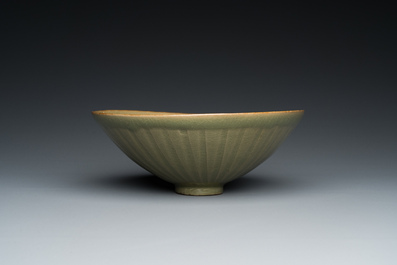 A Chinese Yaozhou celadon bowl with underglaze floral design, probably Song