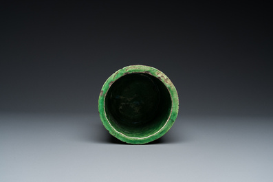 A Chinese monochrome green-glazed relief-molded brush pot, 19th C.
