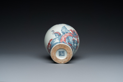 A Chinese blue, white and copper-red 'meiping' vase with cranes, Yongzheng mark, 19/20th C.