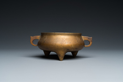 A Chinese bronze tripod censer, Xuande mark, 18th C.