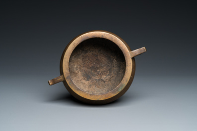 A Chinese bronze tripod censer, Xuande mark, 18th C.