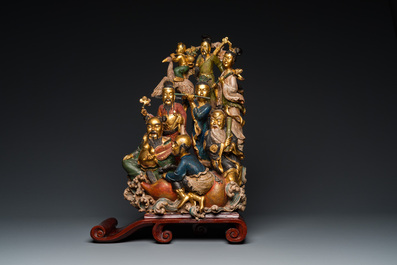 A Chinese polychromed and lacquered wooden 'immortals' group, 19/20th C.