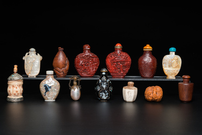 Thirteen Chinese wood, lacquer, mother-of-pearl and bone snuff bottles, 19/20th C.