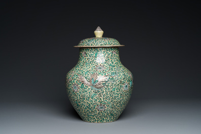 A Chinese yellow-ground verte biscuit 'dragons' vase and cover, 19th C.