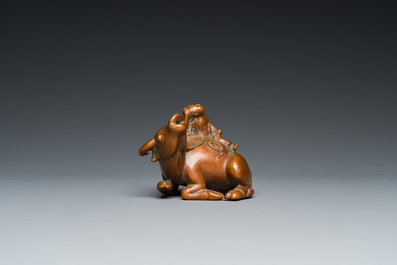 A Chinese bronze 'boy on buffalo' water dropper, Qing