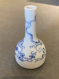 A small Chinese blue and white 'dragon' bottle vase, Yongzheng mark and possibly of the period