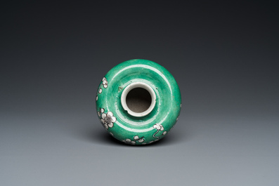 A Chinese verte biscuit 'prunus flowers' water pot, 19th C.