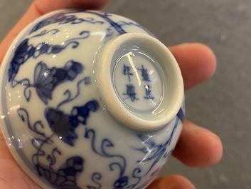 Three Chinese blue and white 'grapevine' bowls, Yongzheng mark and of the period