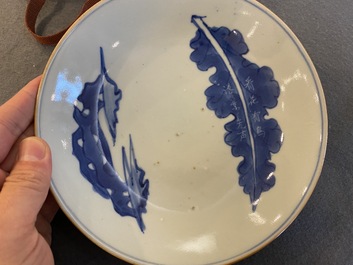 A fine Chinese blue and white 'leaf and scholar&rsquo;s rock' plate, Shunzhi