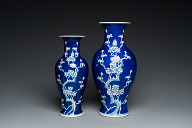 Two Chinese blue and white 'prunus' vases with kintsugi repairs, Qianlong mark, 20th C.
