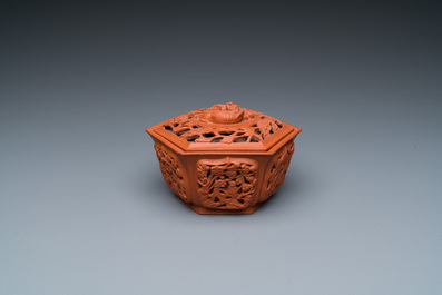 A Chinese Yixing stoneware reticulated hexagonal bowl and cover, Kangxi