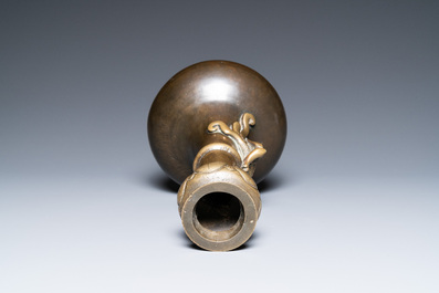 A Chinese bronze garlic-head 'hu' vase, Qianlong mark and probably of the period