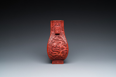 A Chinese red cinnabar lacquer 'fanghu' vase, 19/20th C.