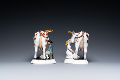 A pair of cold-painted white Dutch Delftware milking groups, 18th C.