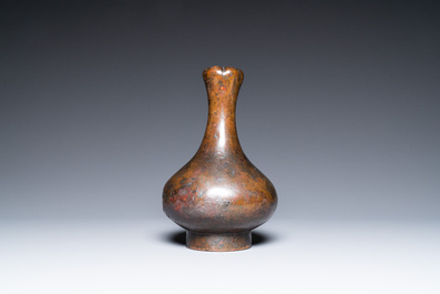 A Chinese bronze garlic-head 'hu' wine vessel, Eastern Zhou/Han
