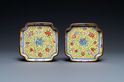A pair of Chinese Canton enamel yellow-ground dishes, Qianlong mark, 18/19th C.