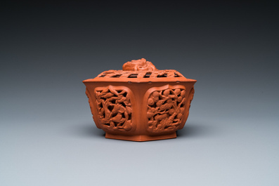 A Chinese Yixing stoneware reticulated hexagonal bowl and cover, Kangxi