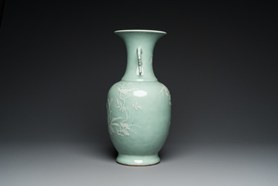 A Chinese slip-decorated celadon-ground vase, Qianlong mark and of the period
