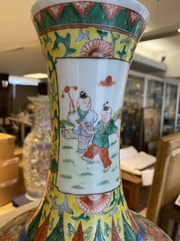 A Chinese famille verte bottle vase, Kangxi mark, 19/20th C.