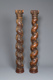A pair of patinated wooden 'grapevine' columns, 18th C.