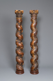 A pair of patinated wooden 'grapevine' columns, 18th C.