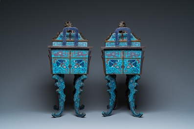 A pair of large Chinese cloisonn&eacute; 'fangding' censers and covers on wooden stands, 19th C.