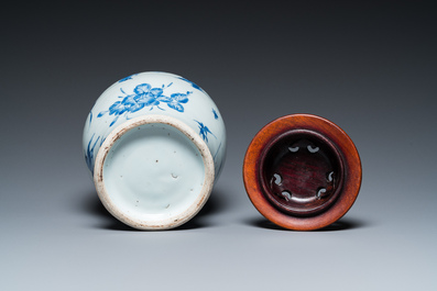 A Chinese blue and white vase with birds among blossoming branches, Transitional period