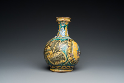 A polychrome Italian maiolica pharmacy bottle, 17th C.