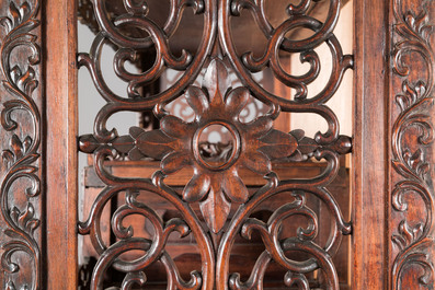 A Chinese reticulated hardwood display cabinet, 19th C.