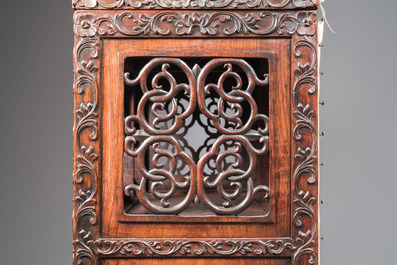 A Chinese reticulated hardwood display cabinet, 19th C.