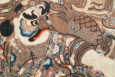 A large Chinese silk and metallic thread embroidered wall tapestry with an opera scene, 19th C.