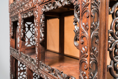 A Chinese reticulated hardwood display cabinet, 19th C.