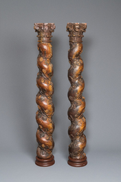 A pair of patinated wooden 'grapevine' columns, 18th C.