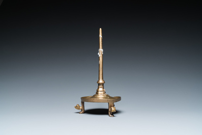 A Flemish or Dutch bronze candlestick, 14/15th C.