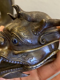 A Chinese bronze dragonfish form censer, Ming