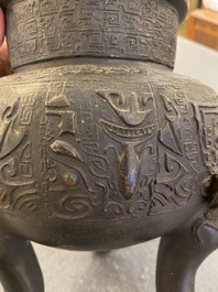 A Chinese bronze tripod 'taotie' censer, Ming