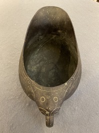 A rare Chinese inscribed archaistic bronze 'Yi' pouring vessel, Zhenghe, Northern Song