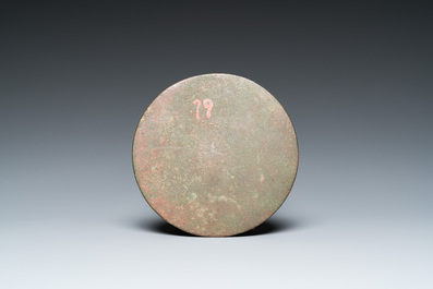 A Chinese bronze mirror, Ming