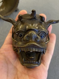 A Chinese bronze dragonfish form censer, Ming